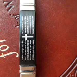 Cross bracelet w/ Spanish Lord's prayer